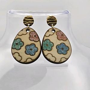 Boucles florales pailletées
